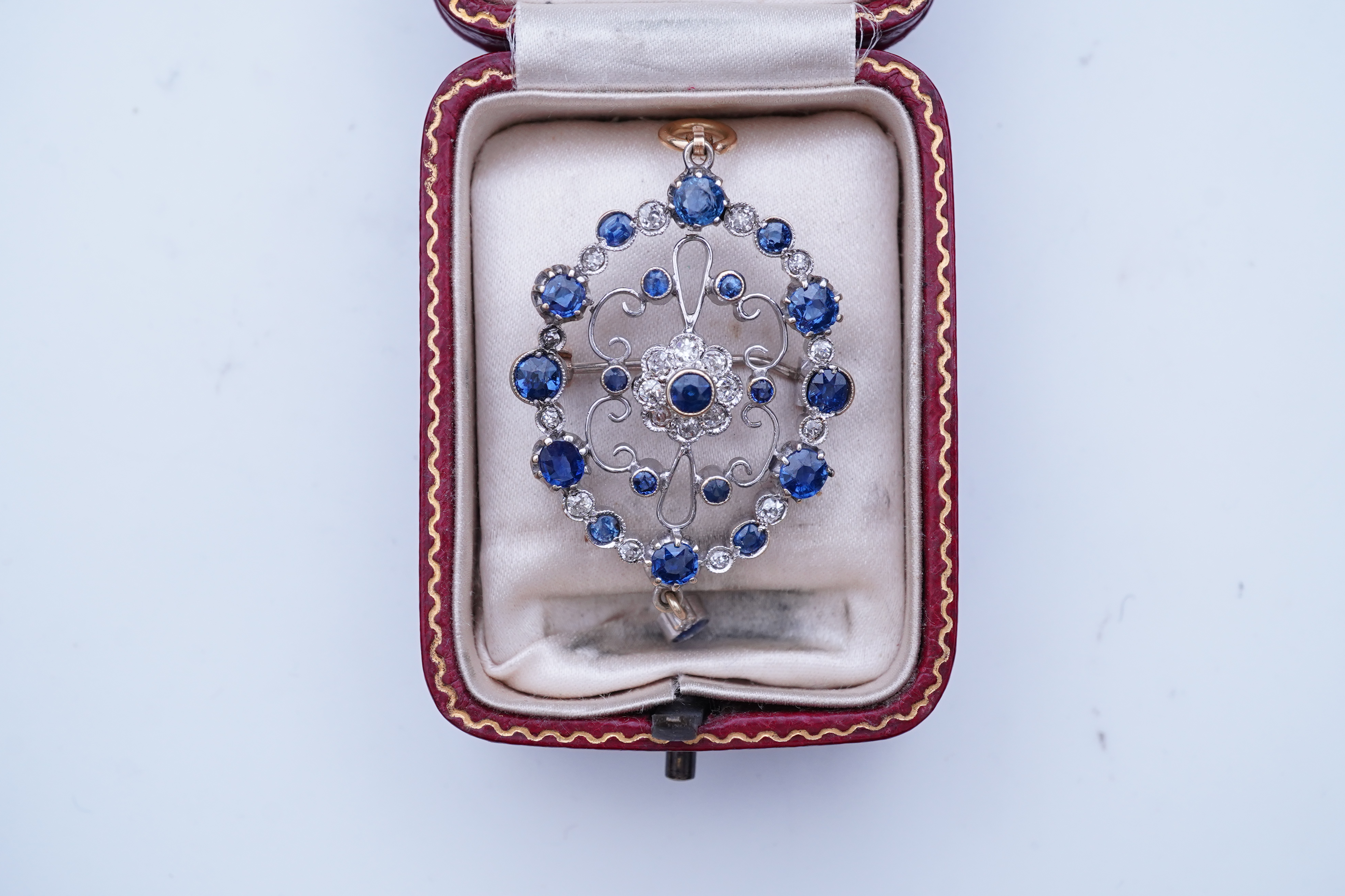 A sapphire and diamond brooch/pendant, mid 20th century